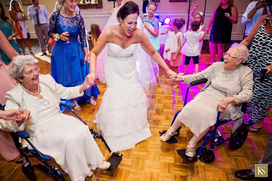Bride with grandmas on dance floor