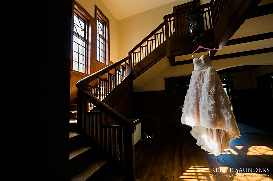 Pink wedding dress, mansion wedding dress hanging from stairs